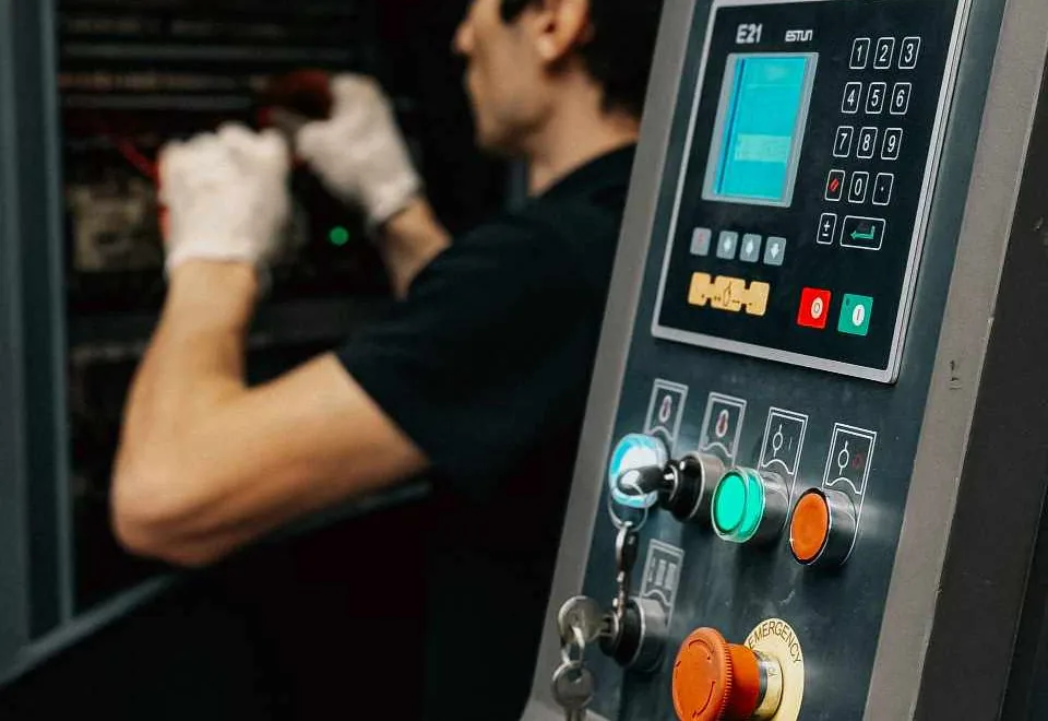 Specialist inspecting technical equipment
